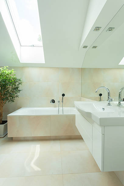 istock Modern bathroom with roof window 518853975