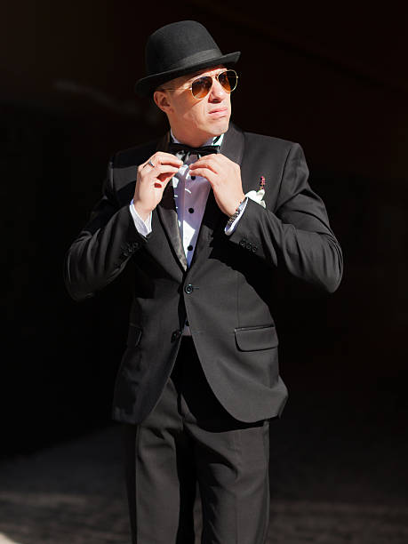 istock Man in tuxedo and hat 518854026