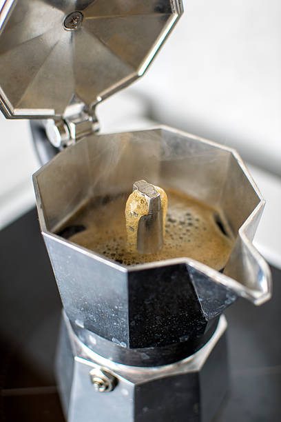 istock Italian vintage coffeepot on kitchen stove 518854696