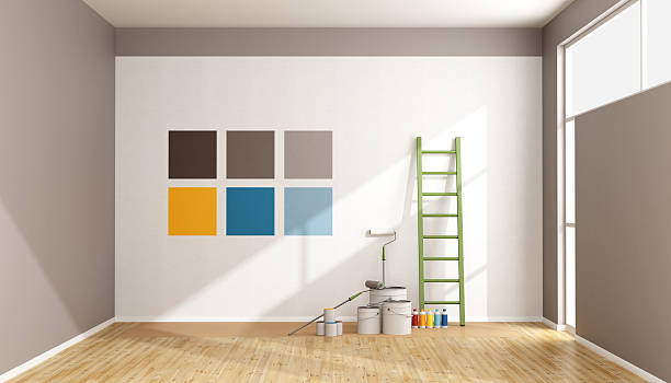 色を選択して、色見壁にペンキを塗る - color swatch paint choice blue ストックフォトと画像