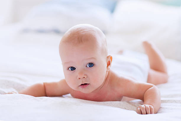 istock Baby boy in diaper 518855456