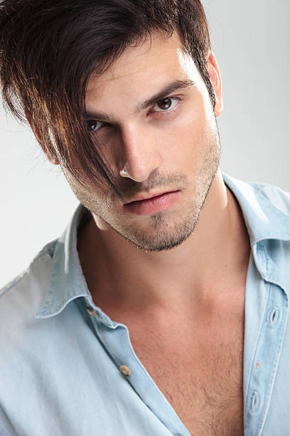 istock Casual young man on gray background 518856877