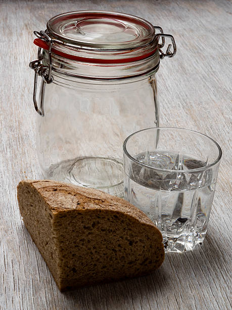 Cтоковое фото Вода, хлеб и пустой Кувшин