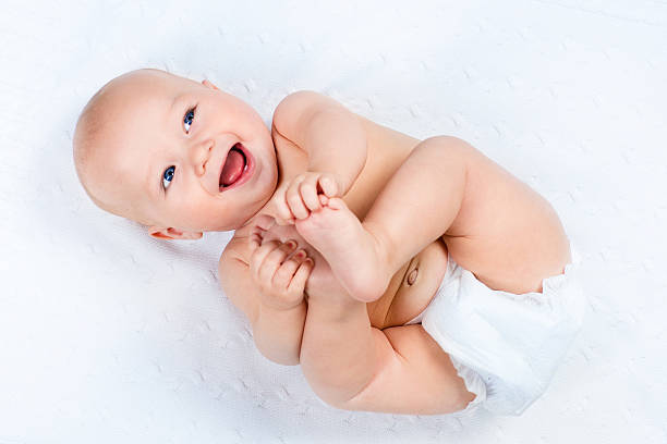 istock Little baby wearing a diaper 518859816