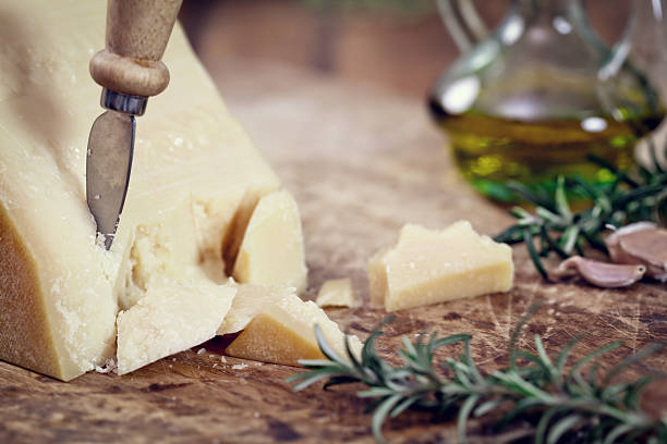 Parmesan Cheese with rosemary and olive oil healthy eating/file_thumbview/89940075/1 grana padano stock pictures, royalty-free photos & images