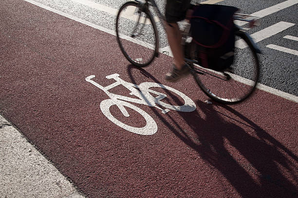 istock Cycle Lane with Cyclist in Dublin 518873577