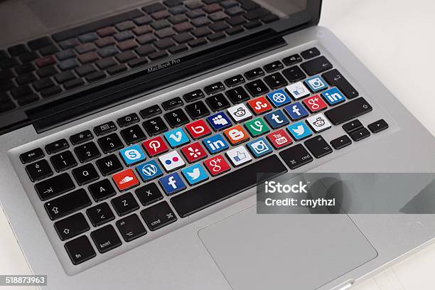 Social Media Logos On Macbook Keyboard Stock Photo - Download Image Now - Auto Post Production Filter, Backgrounds, Big Tech