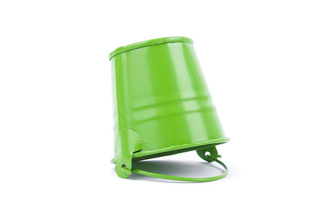 istock Green metal bucket isolated on a white background. 518875911