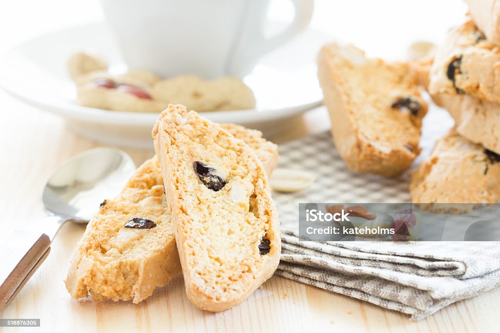 biscuits Cup of coffee and biscotti with peanut and raisins Back Lit Stock Photo