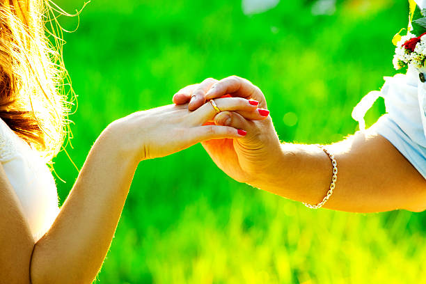 istock hands of the bride and groom 518877773
