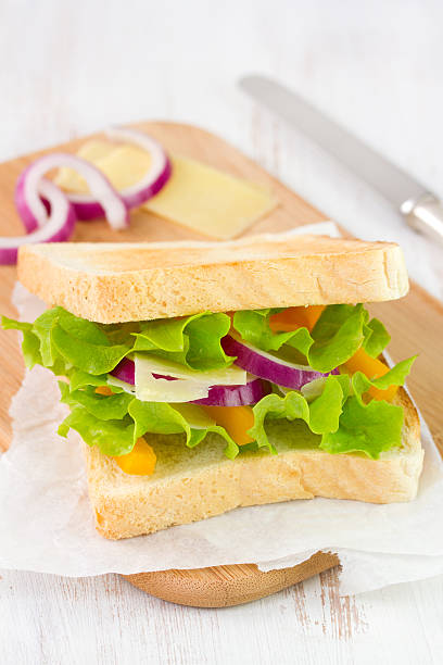 istock sandwich with cheese, lettuce, onion and pepper 518878335