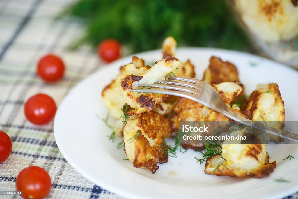 fried cauliflower cauliflower fried in batter on a plate Appetizer Stock Photo