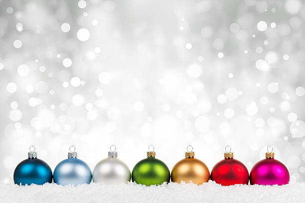 istock Multicolor clean baubles in line on  snow 518879845