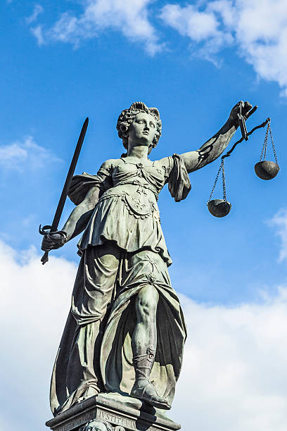 istock Justitia (Lady Justice) sculpture on the Roemerberg  in Frankfurt 518880101