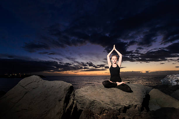istock Meditation yoga on Tenerife beach 518882342