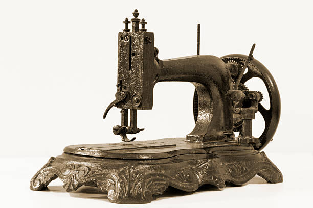 An Old, Hand Sewing Machine. Isolated, On White Background Stock Photo,  Picture and Royalty Free Image. Image 81656832.
