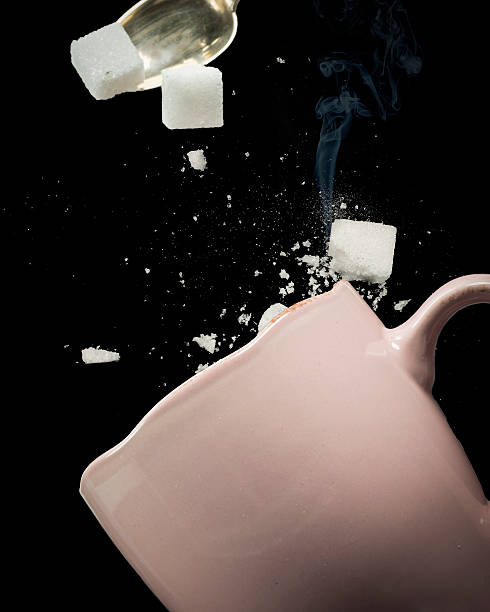 istock Sugar cubes misses the cup 518888366