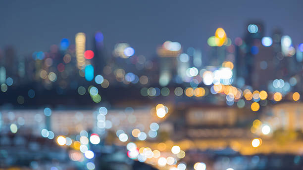 istock Abstract blurred light background city skyline night view 518888518
