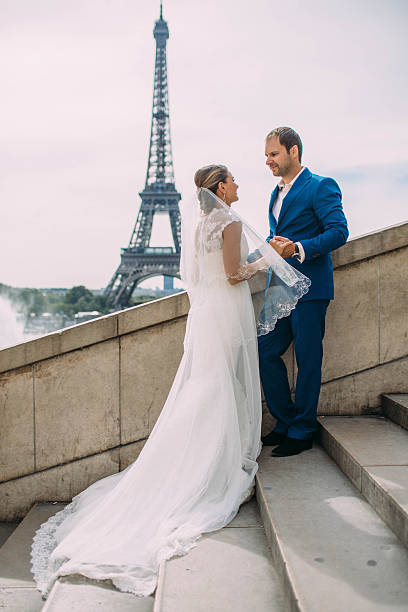 istock Happy bride and groom enjoying their wedding in Paris 518889234