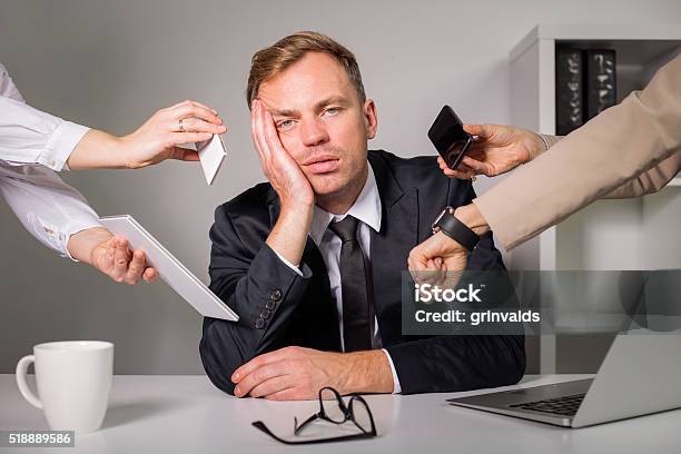 Tired Man Being Overloaded At Work Stock Photo - Download Image Now - Emotional Stress, Mental Burnout, Occupation