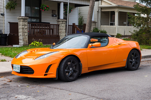 Hamilton, Canada - October 2, 2014: Tesla Roadster Sport electric sports car parked on the street.