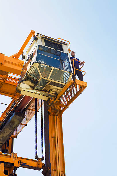 istock Operator On Gantry Of Mobile Crane 518895131