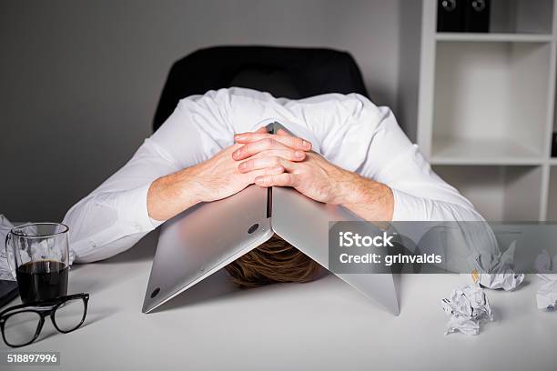 Man Hiding Under Laptop Stock Photo - Download Image Now - Emotional Stress, Working, Occupation