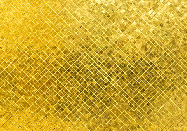 istock Luxury Shiny Golden Tone Rectangle Tile Glass Pattern on Metal 518898340