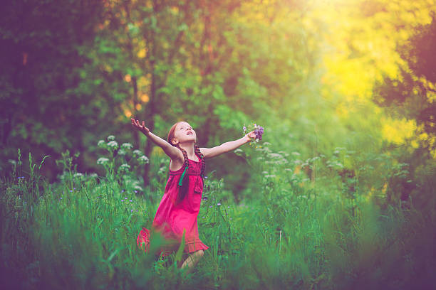 Happy child outdoors in summer