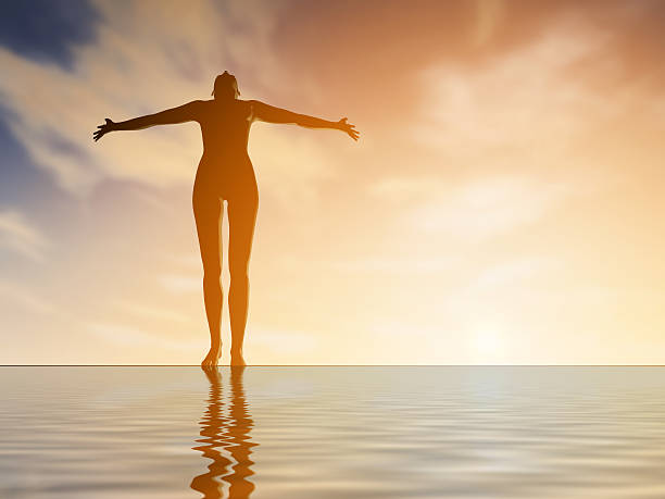 istock Silhouette young woman practicing yoga at sunset 518900412