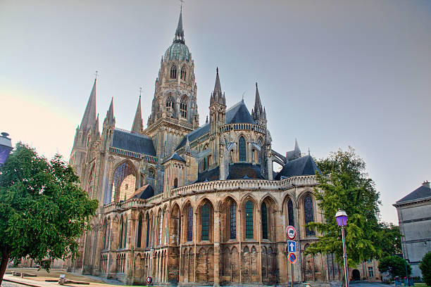 Colour image of Bayeux Cathedral which is a Norman-Romanesque cathedral, located in the town of Bayeux. Image taken on a summer's evening with clear skies.