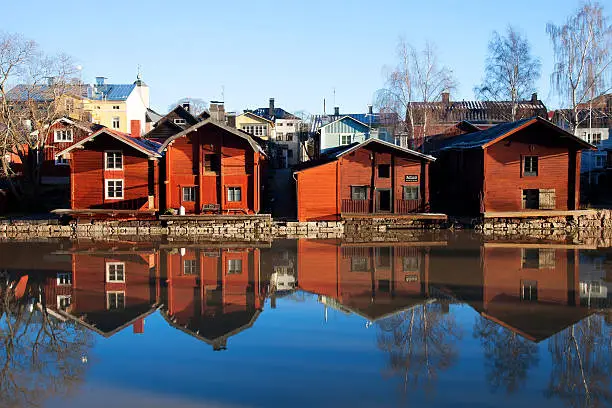 Porvoo, Finland. Classic old wood houses and their reflection in the river