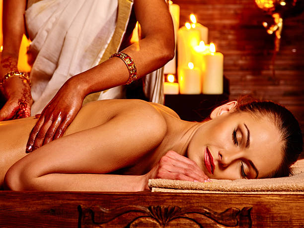 Woman having Ayurvedic spa treatment