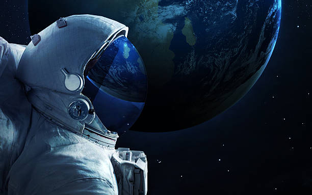 Astronaut in outer space. Spacewalk. Elements of this image furnished Elements of this image furnished by NASA spacewalk photos stock pictures, royalty-free photos & images