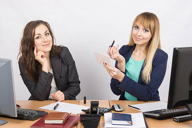 istock Office employee watches as a colleague is going to make 518904680
