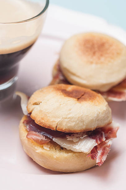 istock Cup of coffee with English muffins 518909060