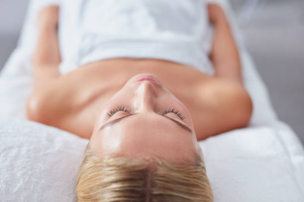 istock Young woman waiting for spa treatment 518909198