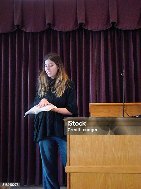 Woman Preaching With Hands On The Bible Stock Photo - Download Image Now - One Woman Only, Women, Females