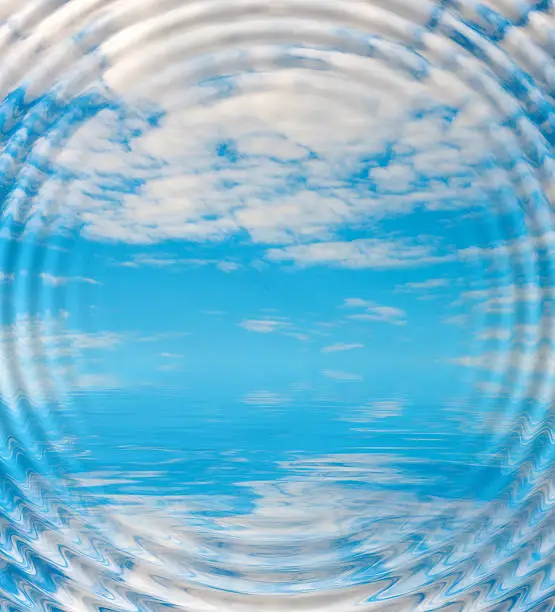 Photo of Surface Rippled of water with clouds and sky background