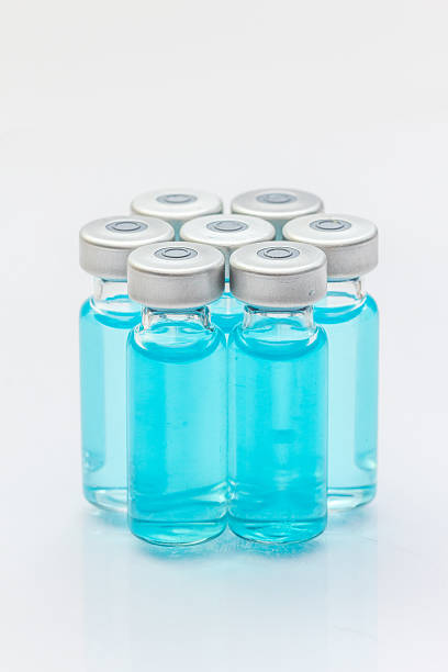 istock the vaccine and a hypodermic syringe 518912049
