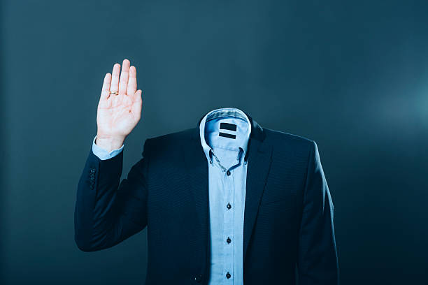 istock Invisible man wearing a suit and waving his hand 518912433