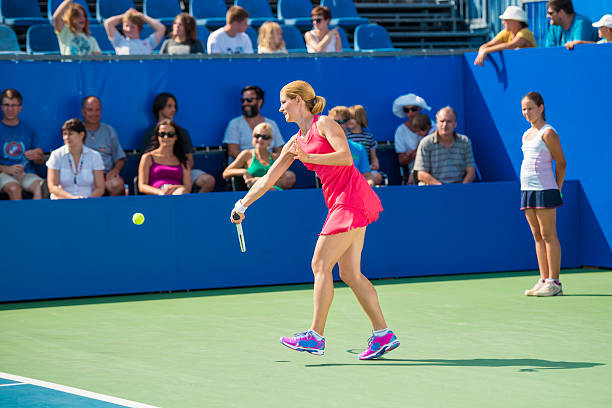 istock Female Professional Tennis Player in Action 518913065