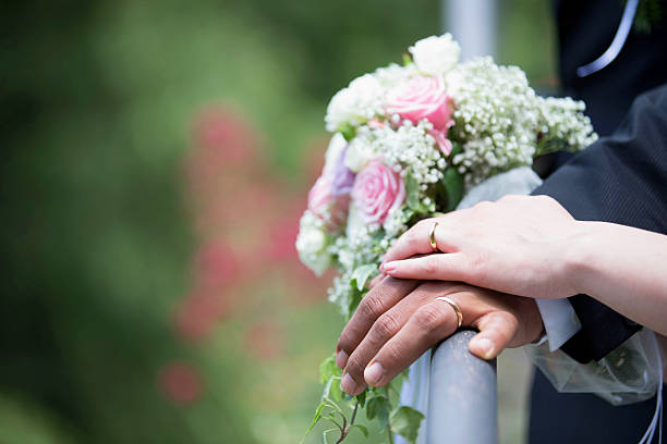 istock Wedding, rings and bouquet 518915097