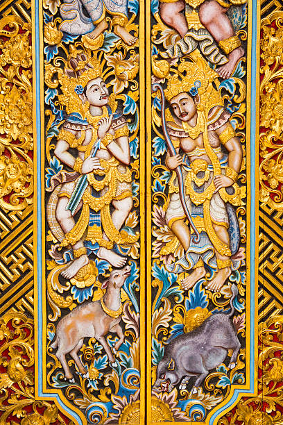 Detail of the door in a Hindu temple The door is fully decorated with oriental motifs and designs in gold. palazzo antico stock pictures, royalty-free photos & images