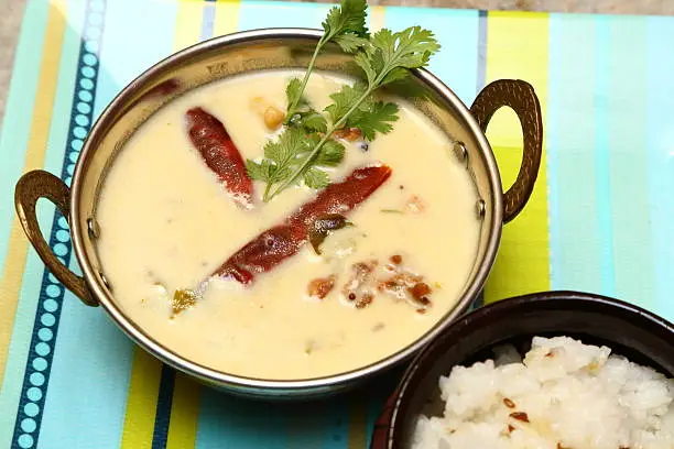 Indian, Rajasthani, Gujarati Curd Curry in a copper bowl