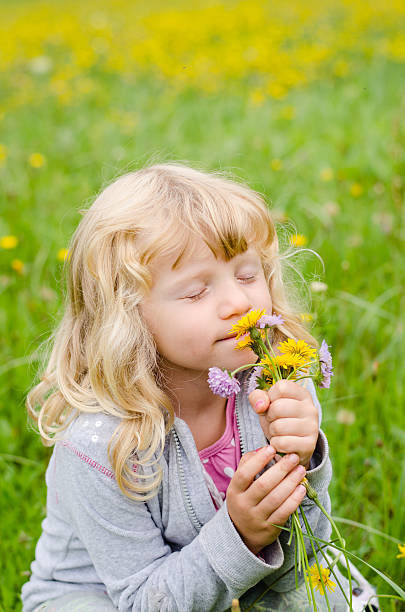 istock girl with flowers 518917881