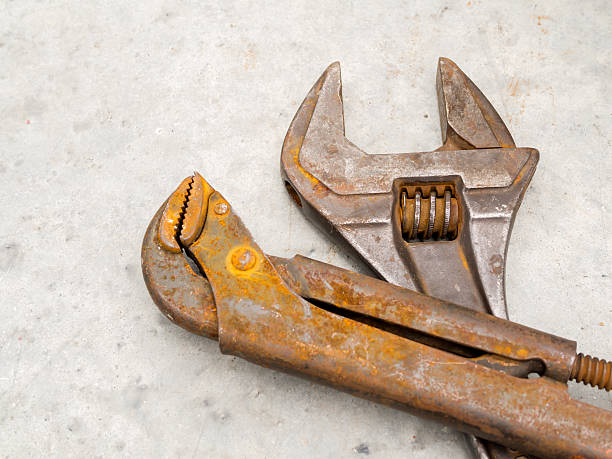 istock Rusty grunge wrench and spanner for maintenance and service engineer 518925783