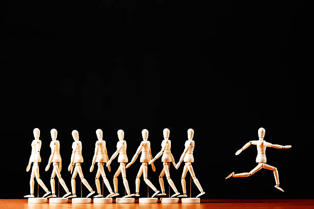 istock I'm out of here! Breakaway puppet leaves the crowd 518927129