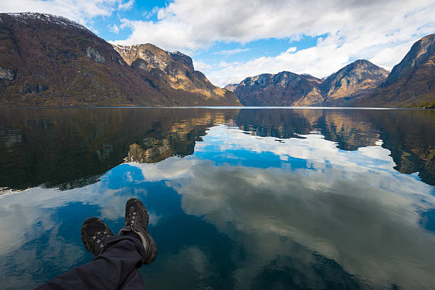 istock Reflections in calm Norway Fjord 518927699