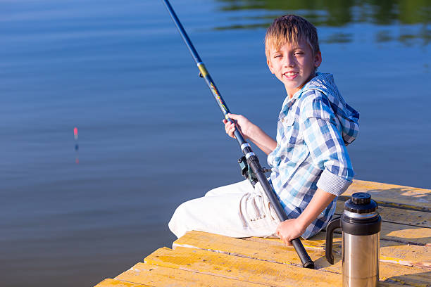 istock Boy in blue shirt sit on a pie 518930091